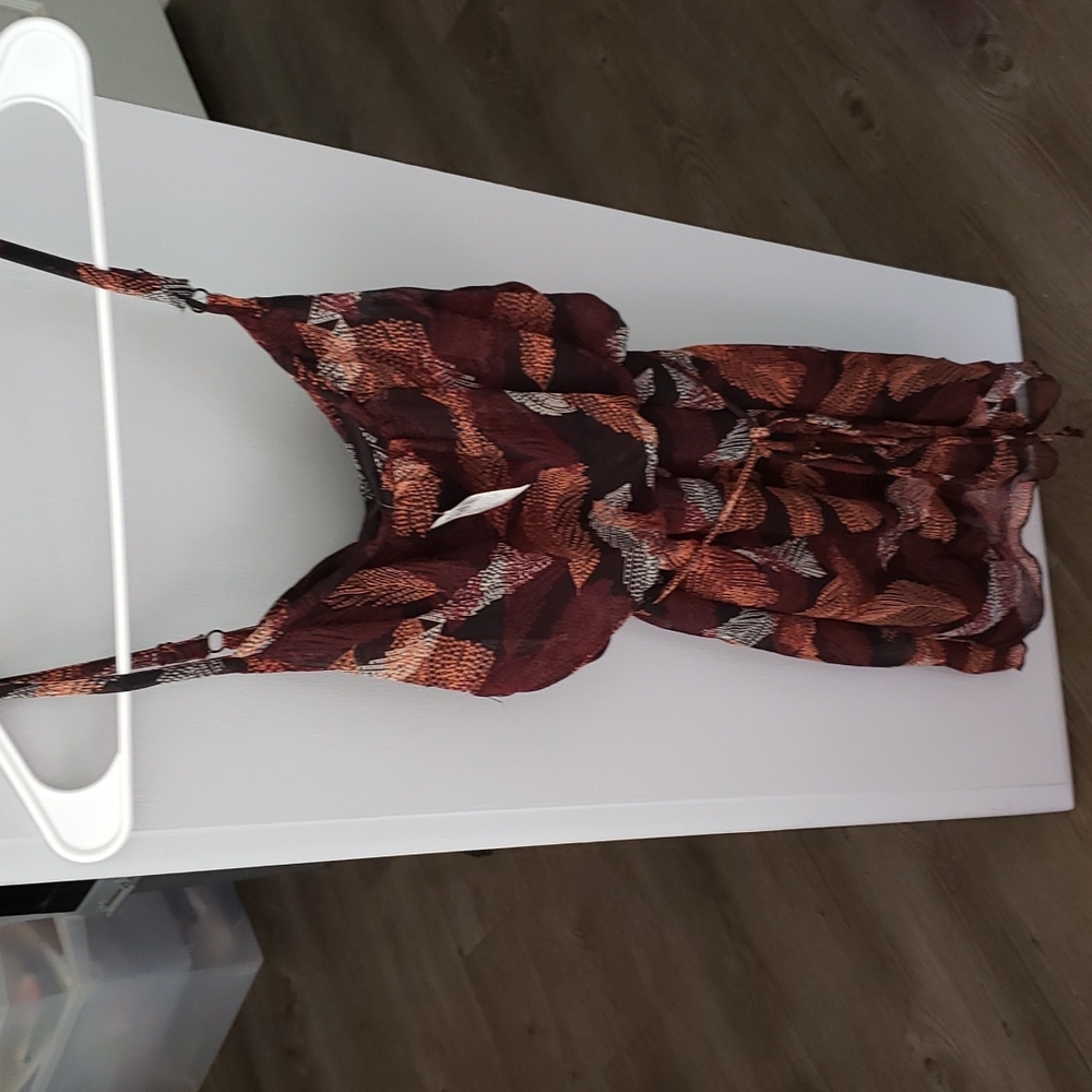 Feather dress size small brand new